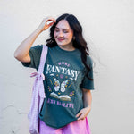 A green t-shirt More Fantasy Less Reality, with a bookish graphic, Fantasy Romance merch, Gift for readers