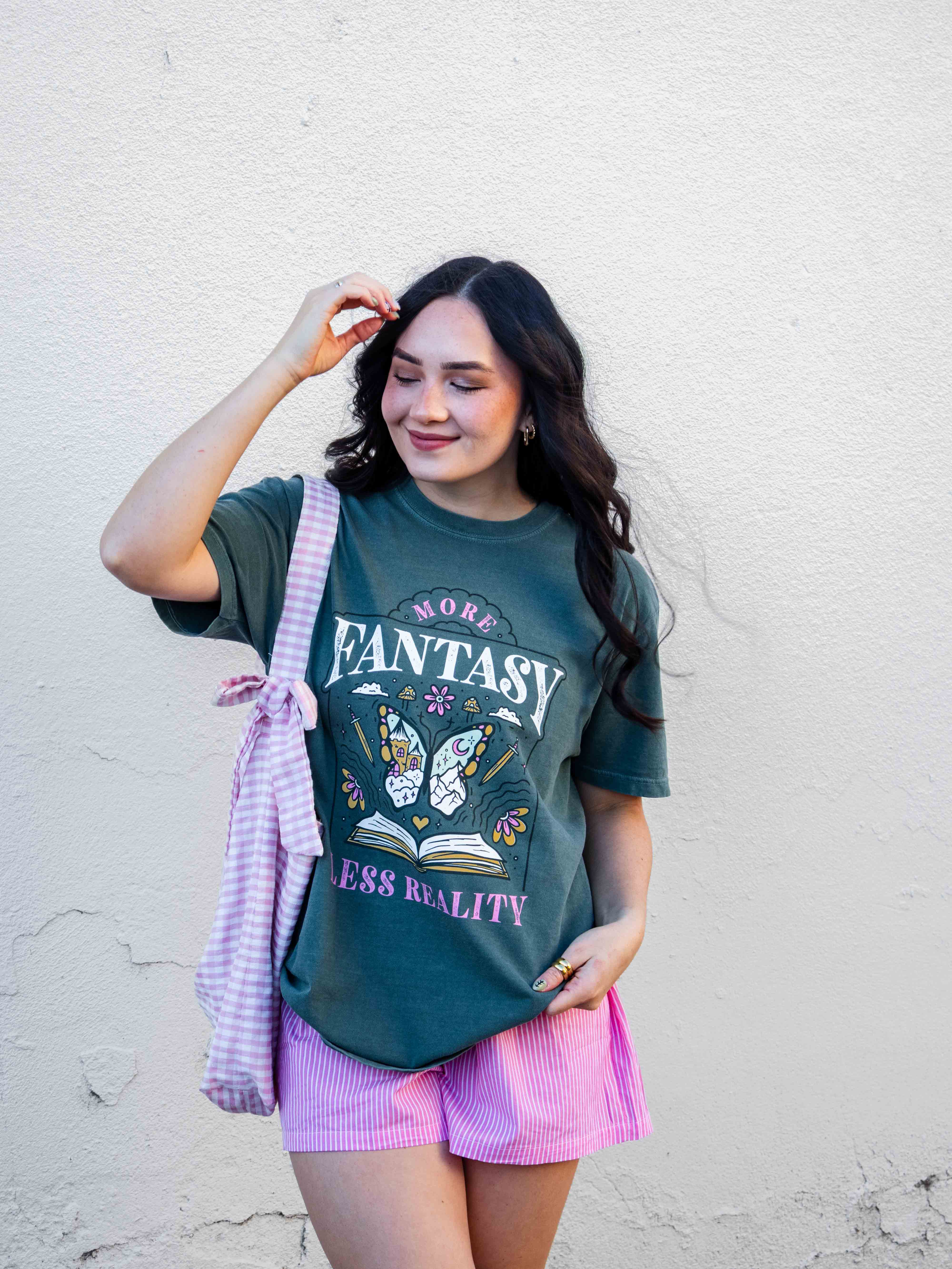 A green t-shirt More Fantasy Less Reality, with a bookish graphic, Fantasy Romance merch, Gift for readers