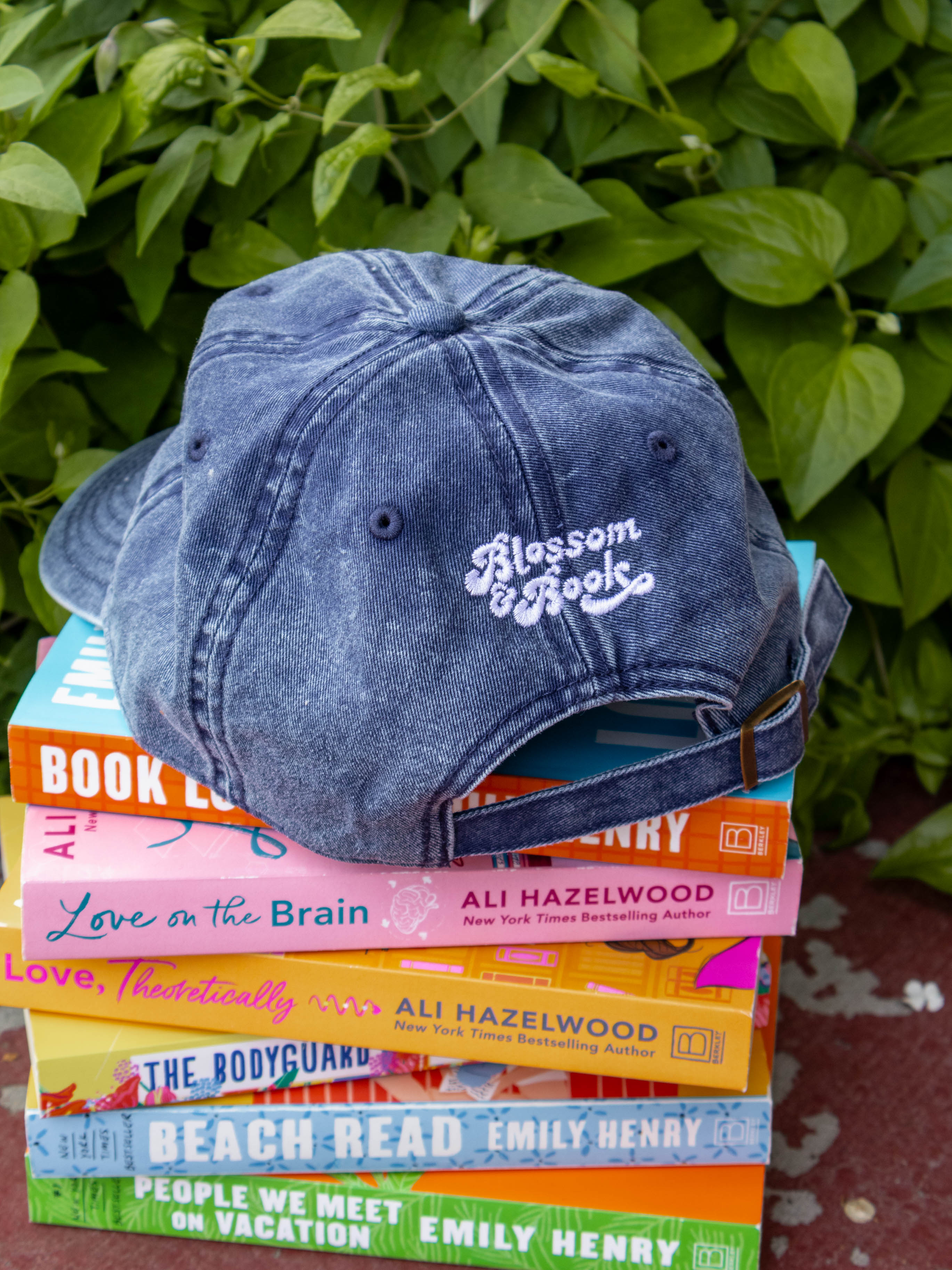 Book Lover dad hat vintage denim wash embroidered design, adjustable strap blossom and book