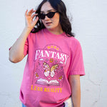 A pink t-shirt More Fantasy Less Reality, with a bookish graphic, Fantasy Romance merch, Gift for readers