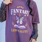 A purple t-shirt More Fantasy Less Reality, with a bookish graphic, Fantasy Romance merch, Gift for readers